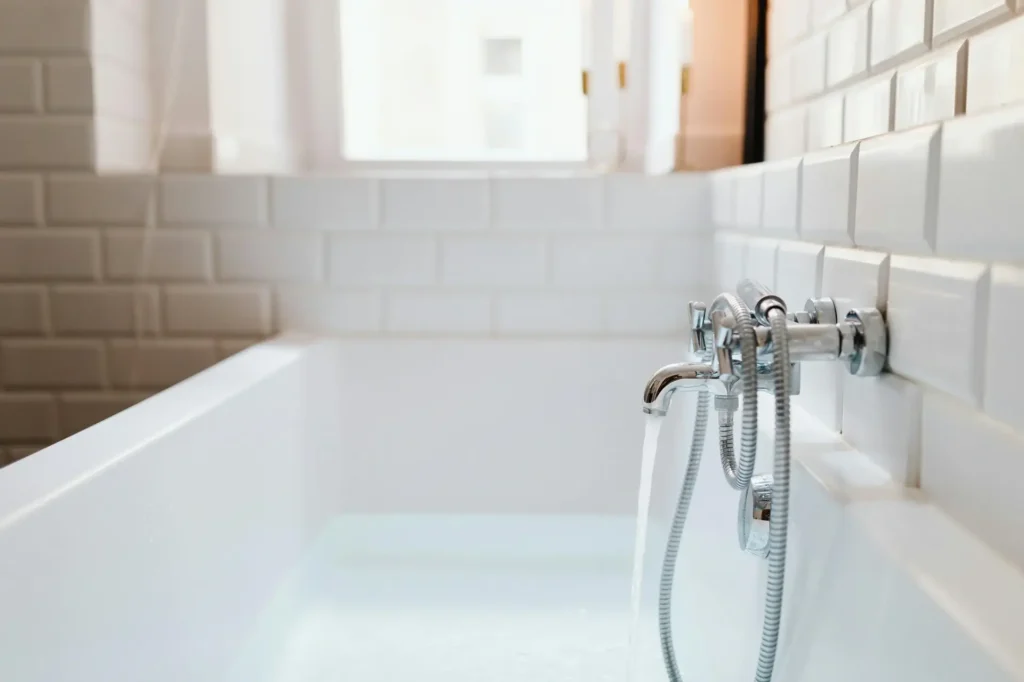 filling a bath tub with water